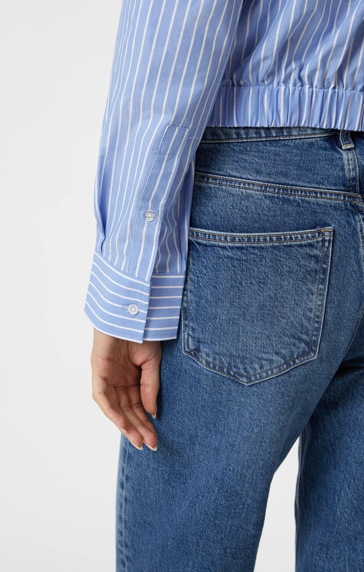 KNOT FRONT LONG SLEEVE SHIRT IN BLUE STRIPED