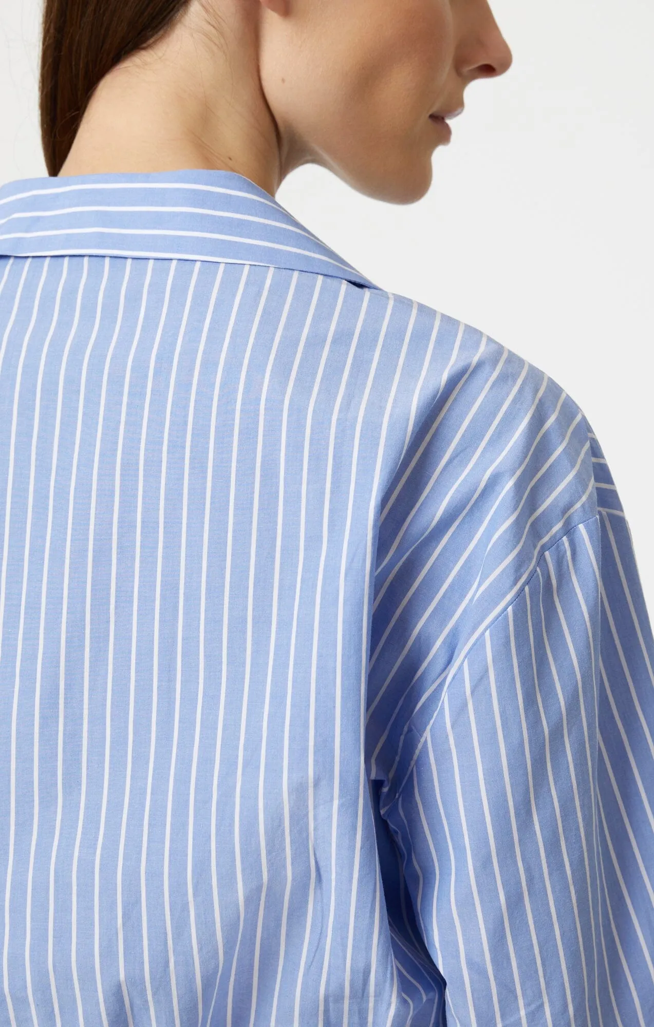 KNOT FRONT LONG SLEEVE SHIRT IN BLUE STRIPED